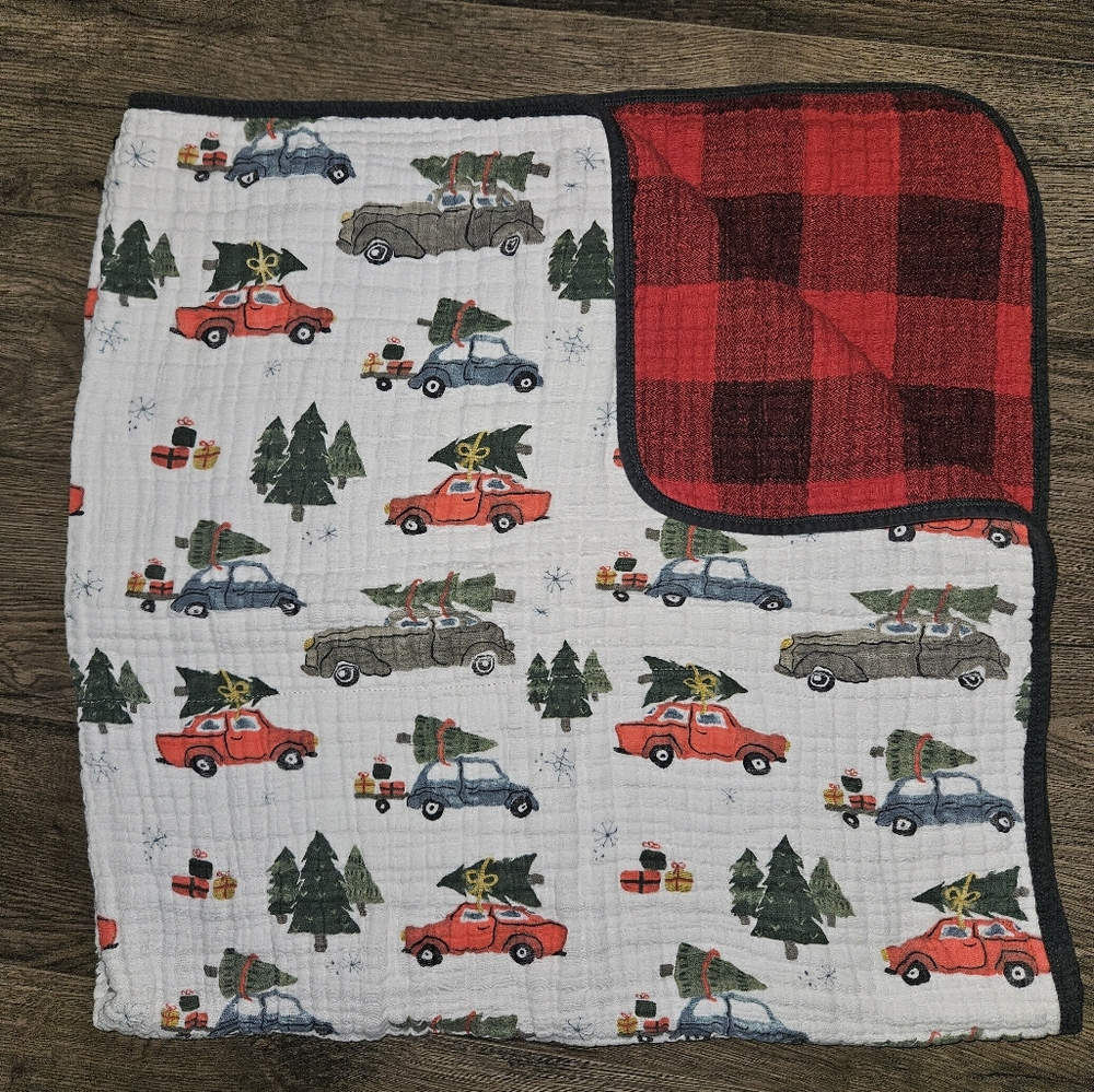 Little Unicorn Cotton Muslin Quilt in holiday haul print